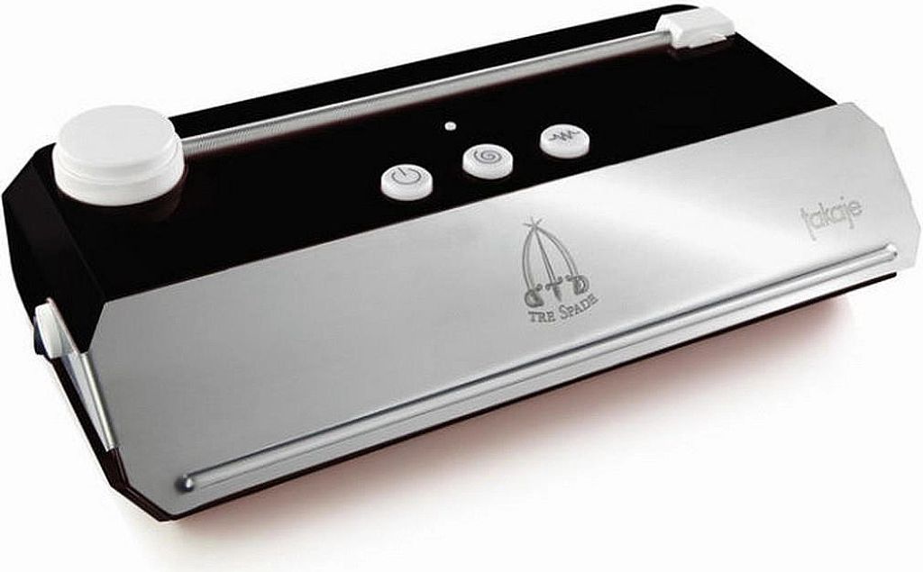 A product shot of a vacuum sealer on a white background.