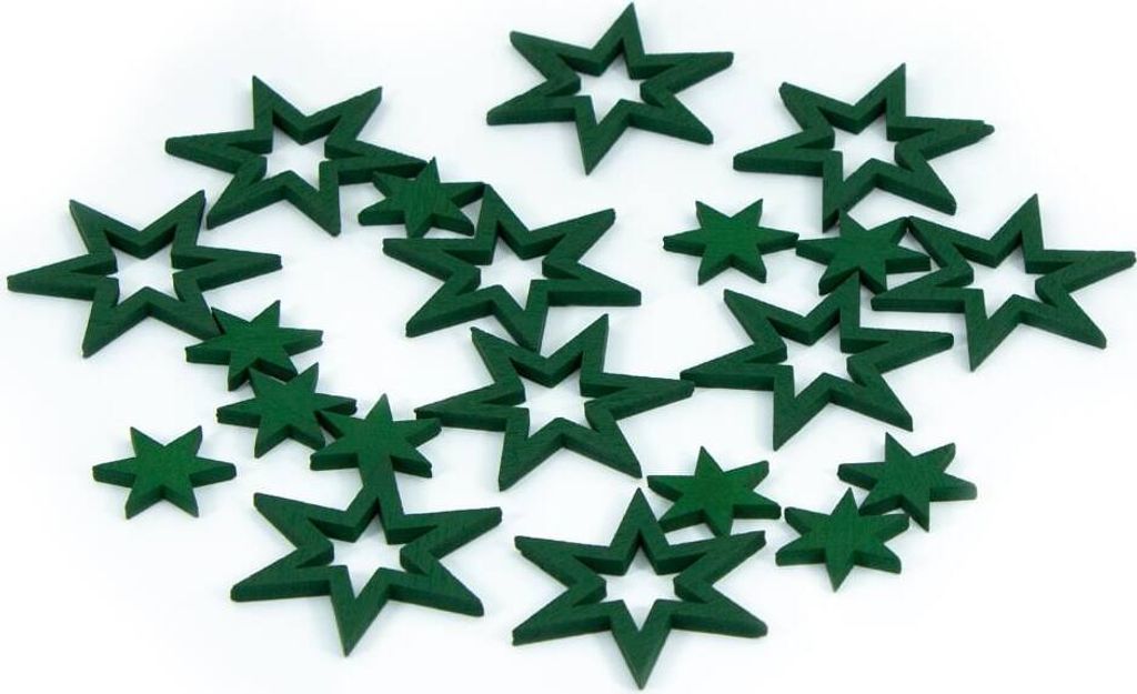 A collection of green wooden stars scattered on a white background.