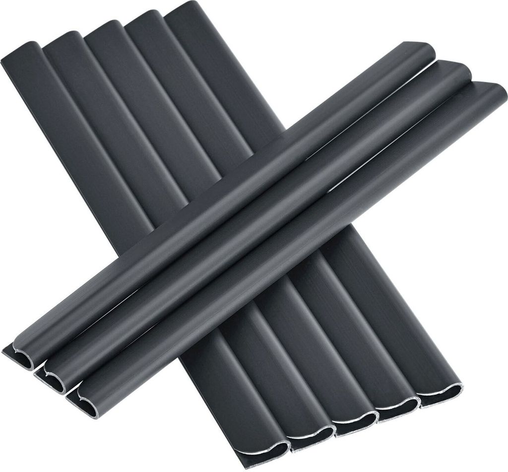 Several dark grey PVC privacy strips are arranged in an X shape against a white background.