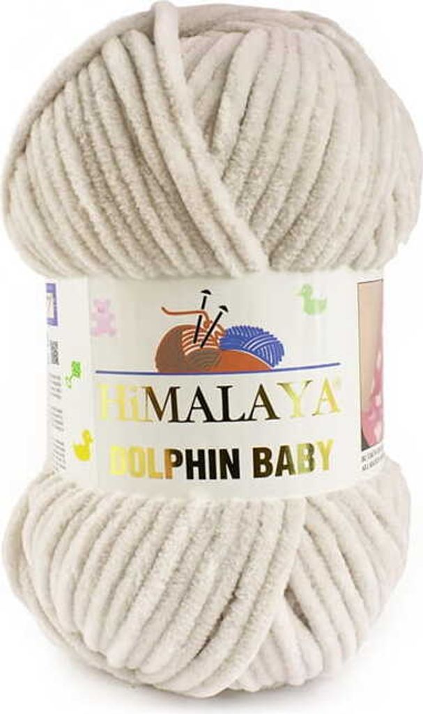 A ball of cream-colored yarn with a label.
