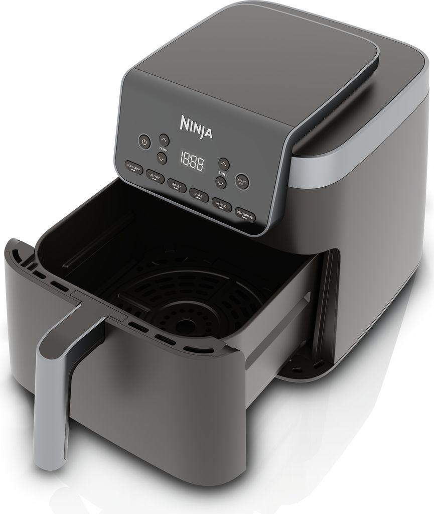 A studio shot of a Ninja air fryer with its basket pulled out.