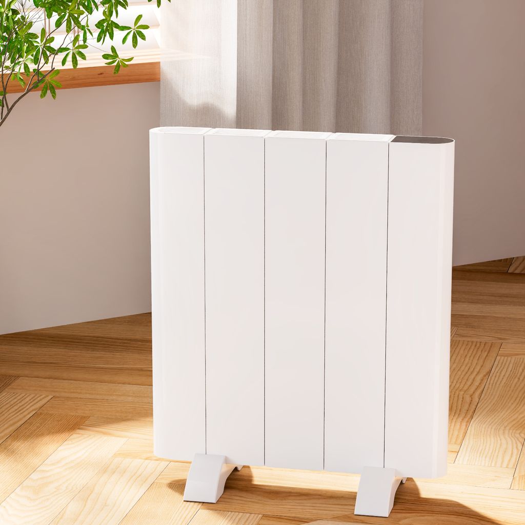 A white electric heater is placed on a wooden floor next to a window with sheer curtains.