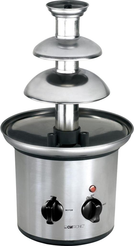 A stainless steel chocolate fountain with two control knobs and a red indicator light on the base.