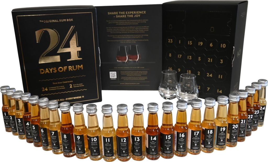 A display of a "24 Days of Rum" advent calendar, featuring small bottles of rum and two tasting glasses.