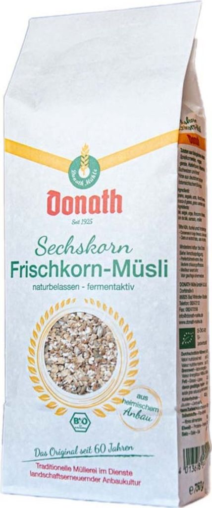 A white paper bag of muesli with branding and product details.