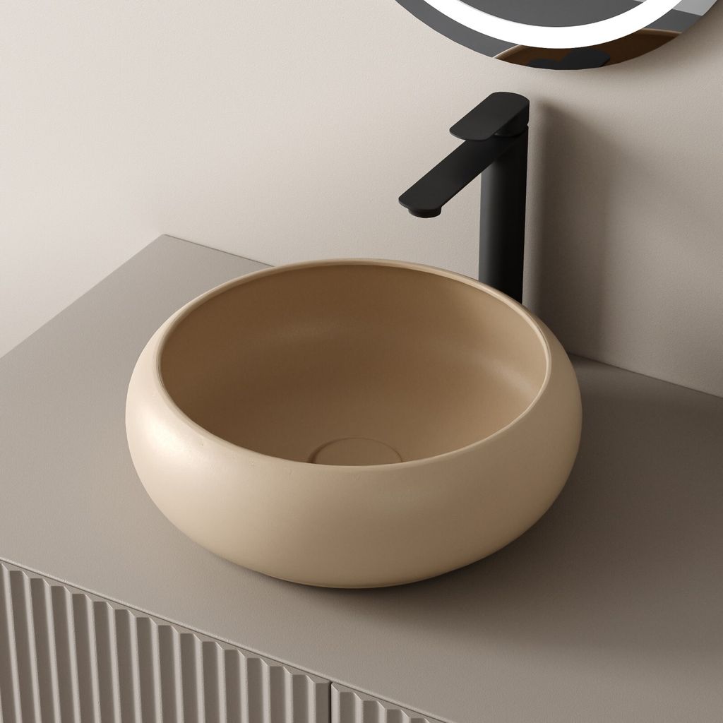 A modern bathroom sink and faucet.