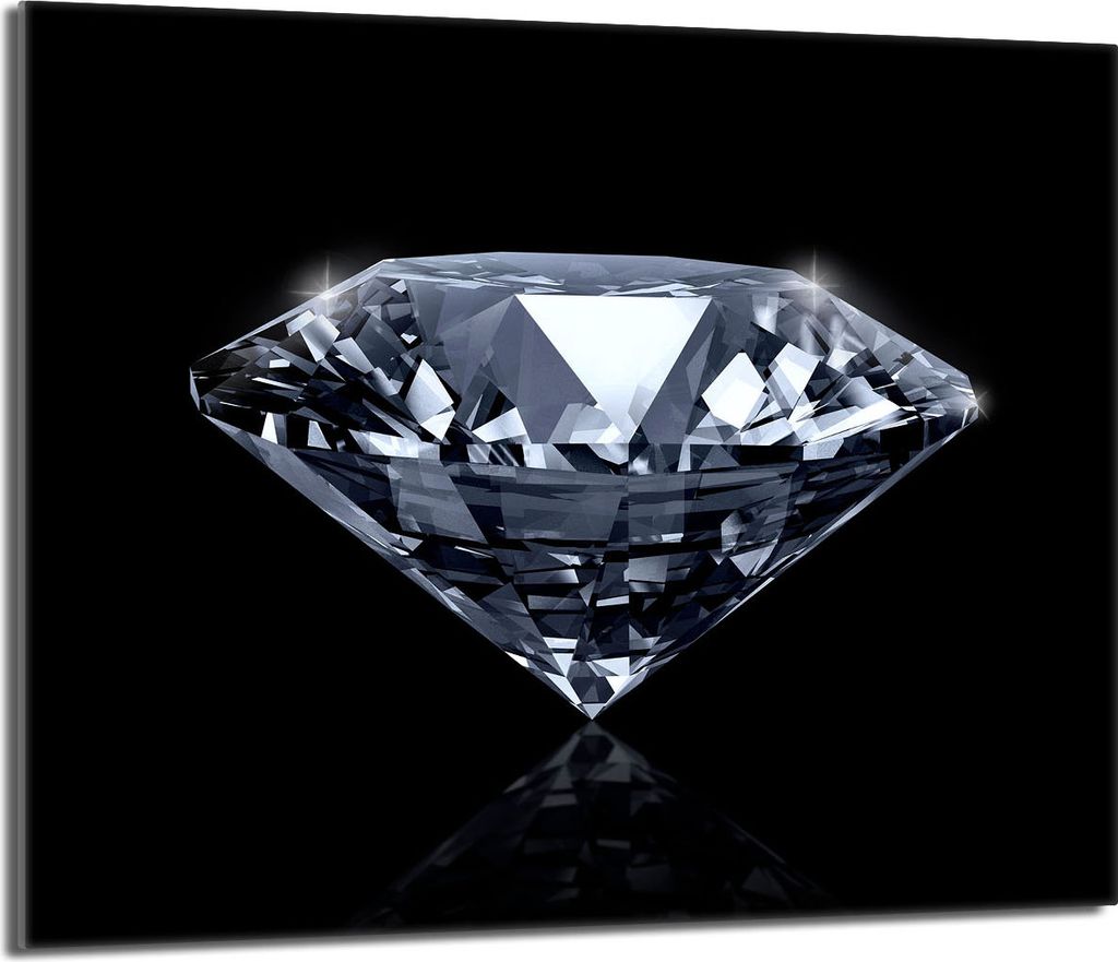 A close-up studio shot of a diamond on a black background.