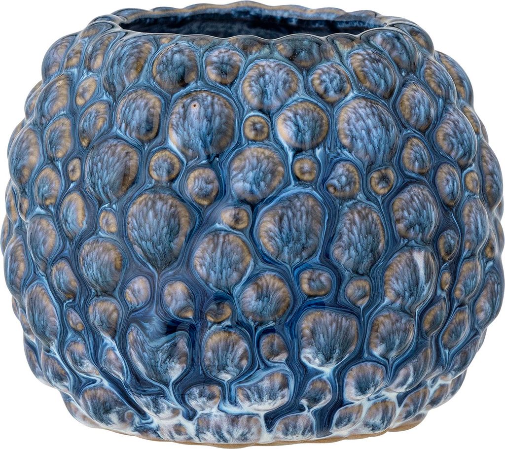 A close-up studio shot of a decorative ceramic pot.