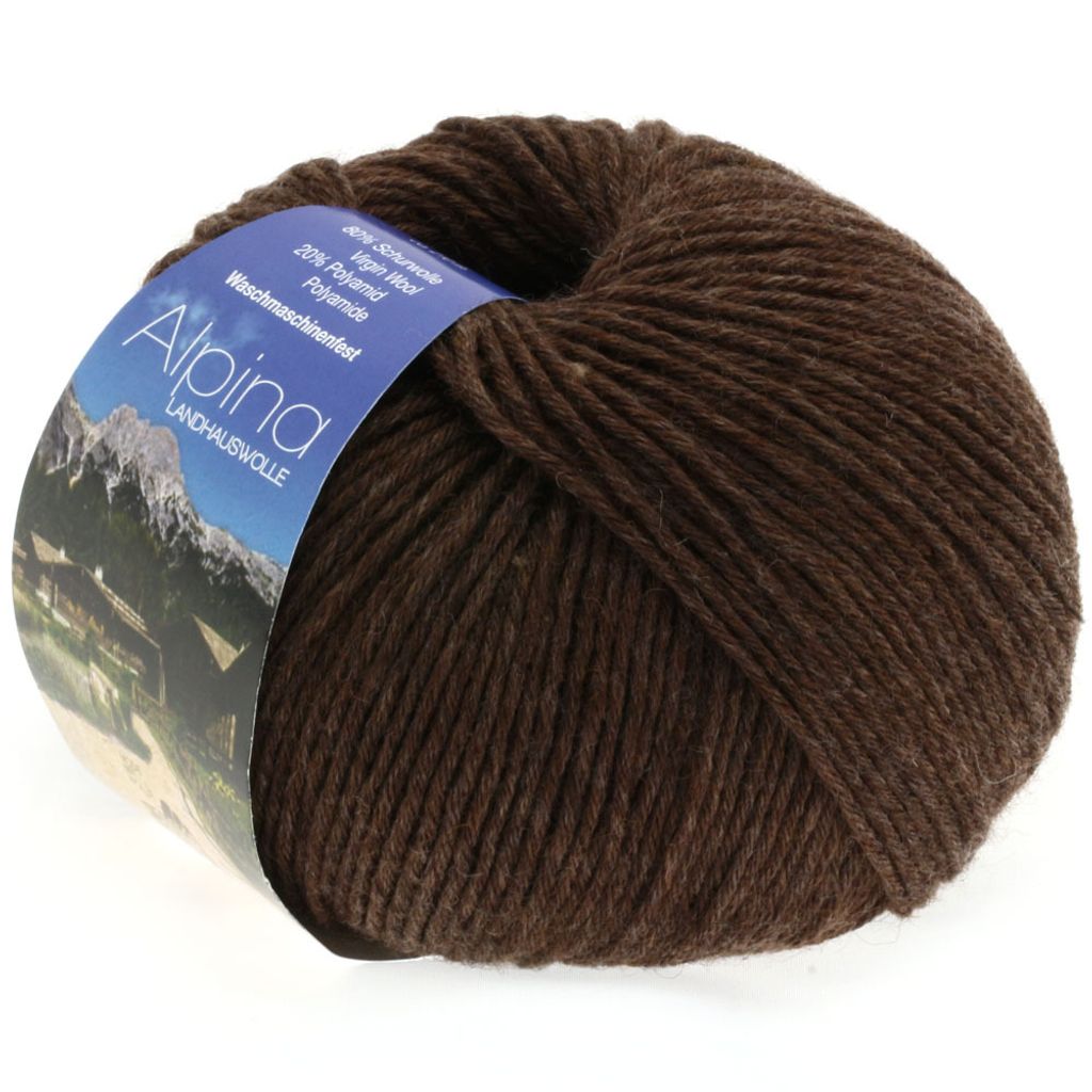 A ball of brown yarn with a label wrapped around it.