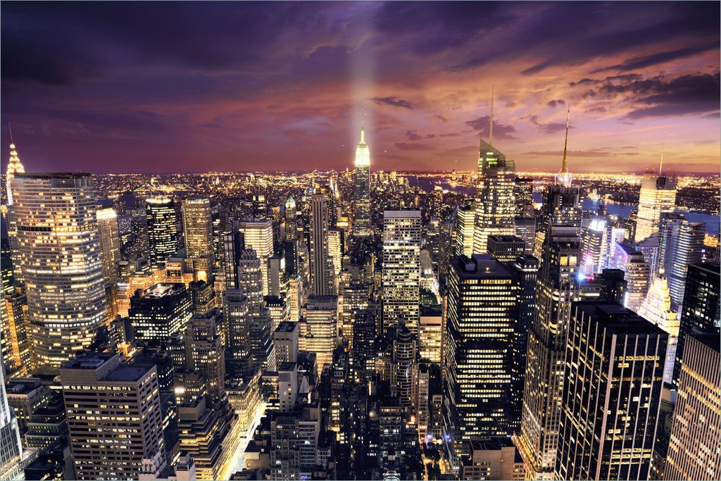 Wallario Premium Vliestapete Fototapete New York bei Nacht - Panoramablick über die Stadt in der Größe 400 x 267 cm, extra dick, wird in 5 Teile...