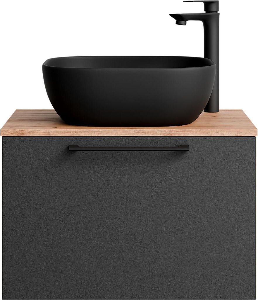 A black vessel sink and faucet are mounted on a wooden countertop above a gray cabinet.
