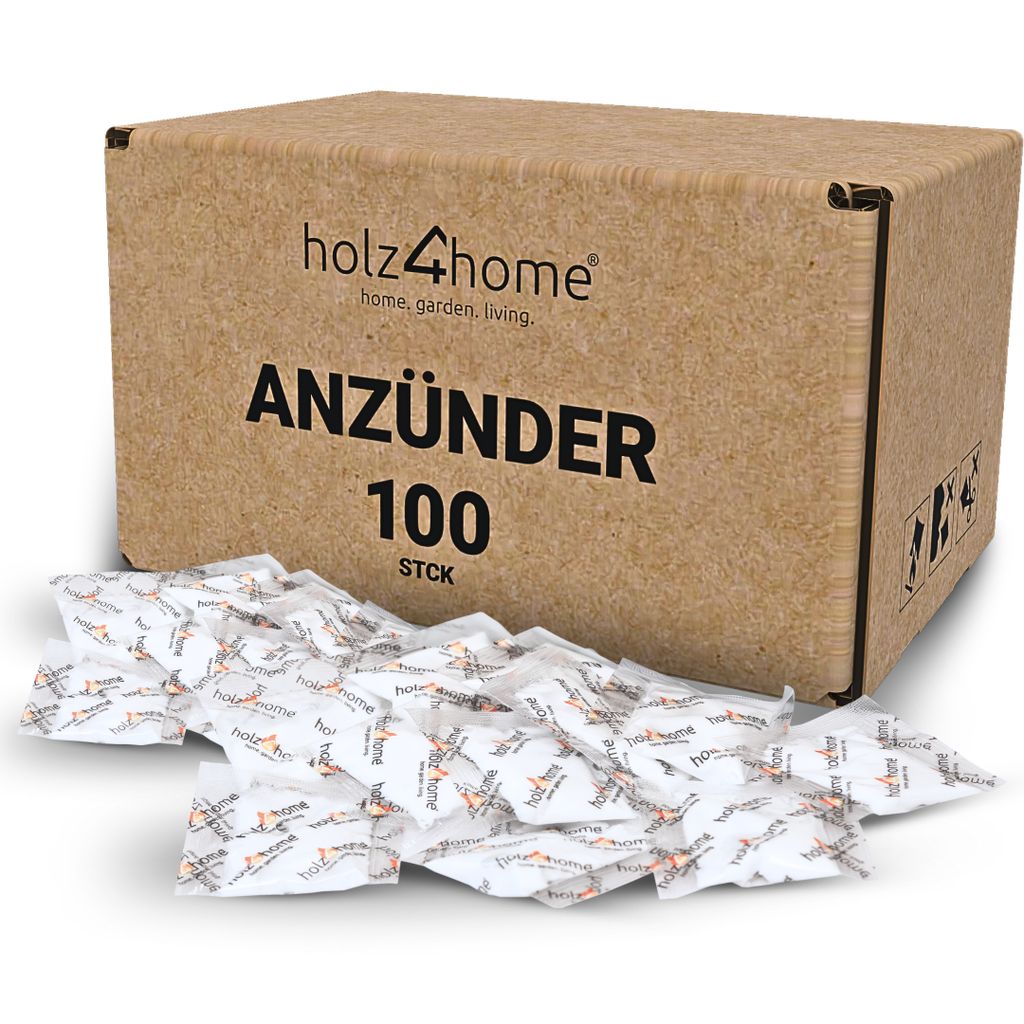 A cardboard box with the brand name and product details, with many small fire starters spilled in front of it.
