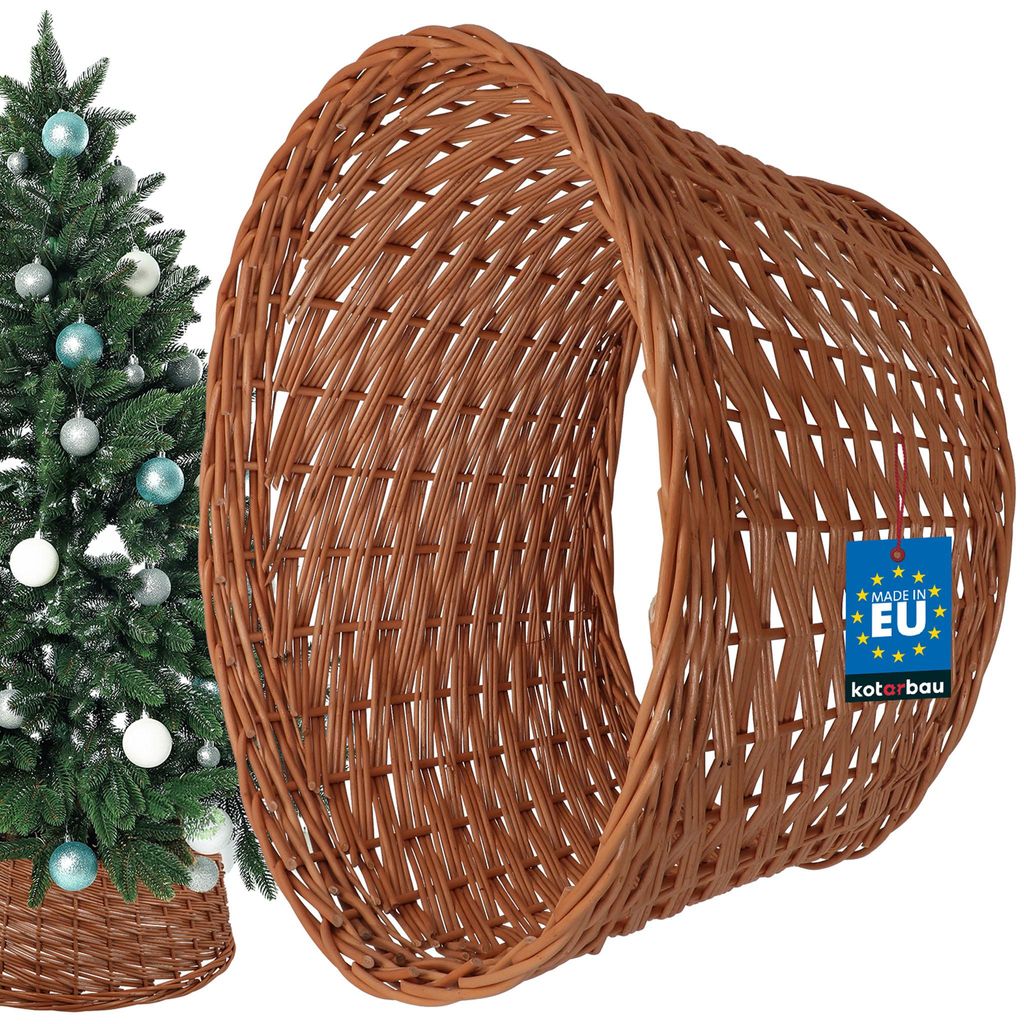 A Christmas tree with ornaments and a wicker tree skirt.