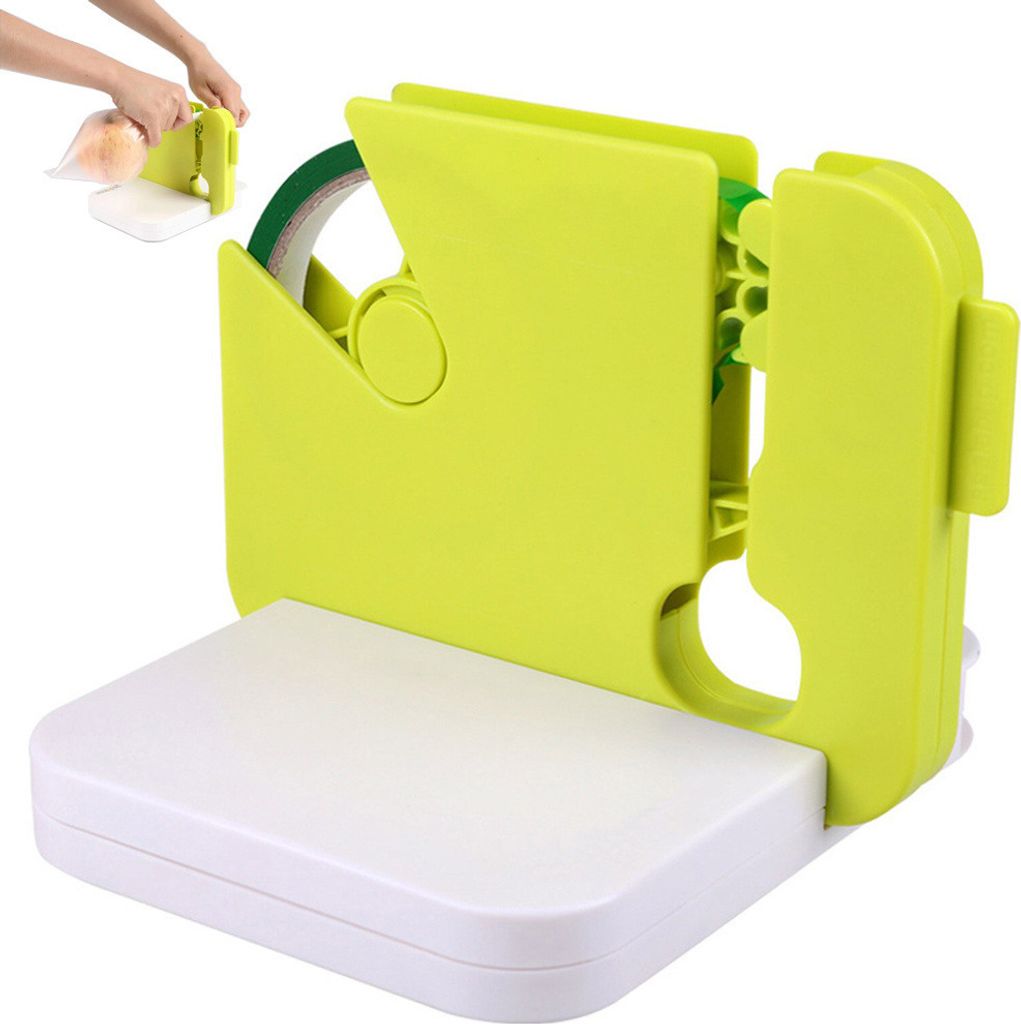 A close-up shot of a green and white bag sealer.