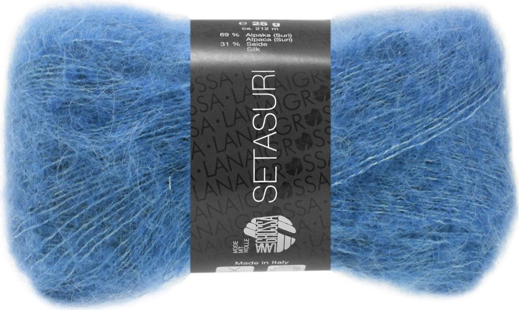 A ball of blue yarn with a black label.