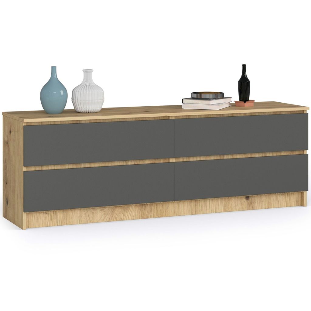 A modern dresser with four drawers and a wooden top, decorated with two vases and a bottle of wine.