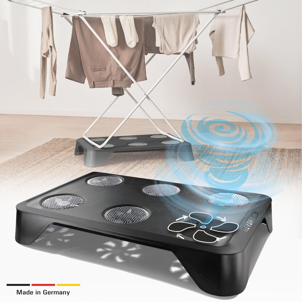 A product for drying clothes is shown in use with a clothes rack and laundry.
