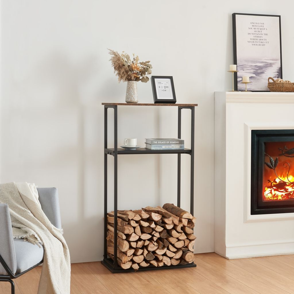 A fireplace and a shelf unit with firewood in a living room.