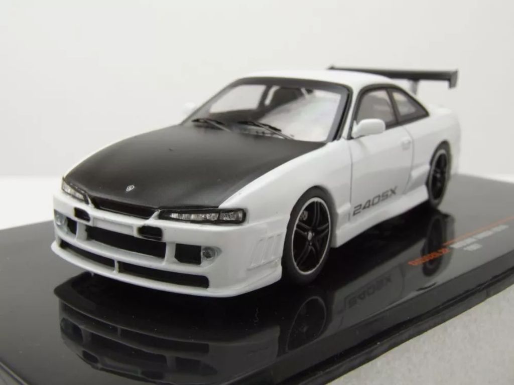IXO IXOCLC552N.22 - 1/43 - Nissan 240 SX (S14), weiss/schwarz, 1997 - Neu