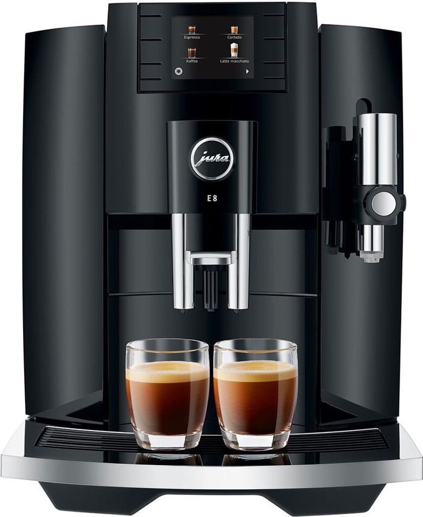 A black JURA coffee machine with two glasses of espresso in front of it.