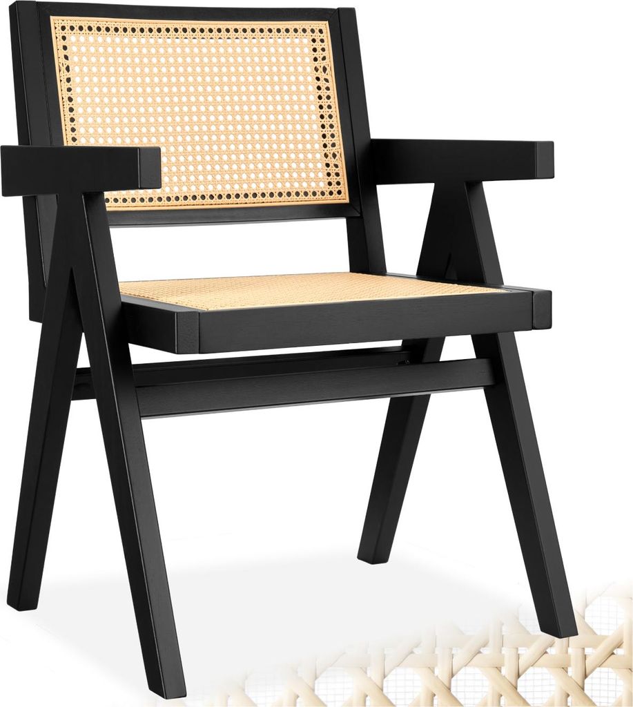 A black armchair with a cane seat and back.