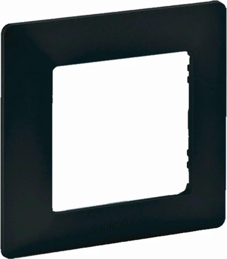 A black frame for an electrical outlet or switch.