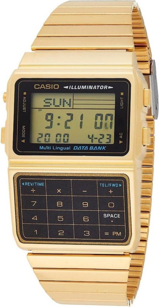 A close-up, front-facing studio shot of a gold Casio Databank watch.