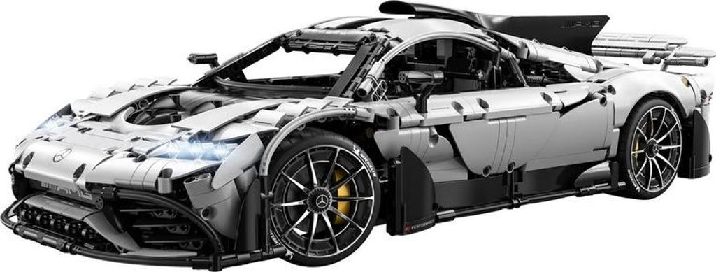 A white Lego model of a Mercedes-AMG Project One car is shown from a 3/4 angle against a white background.