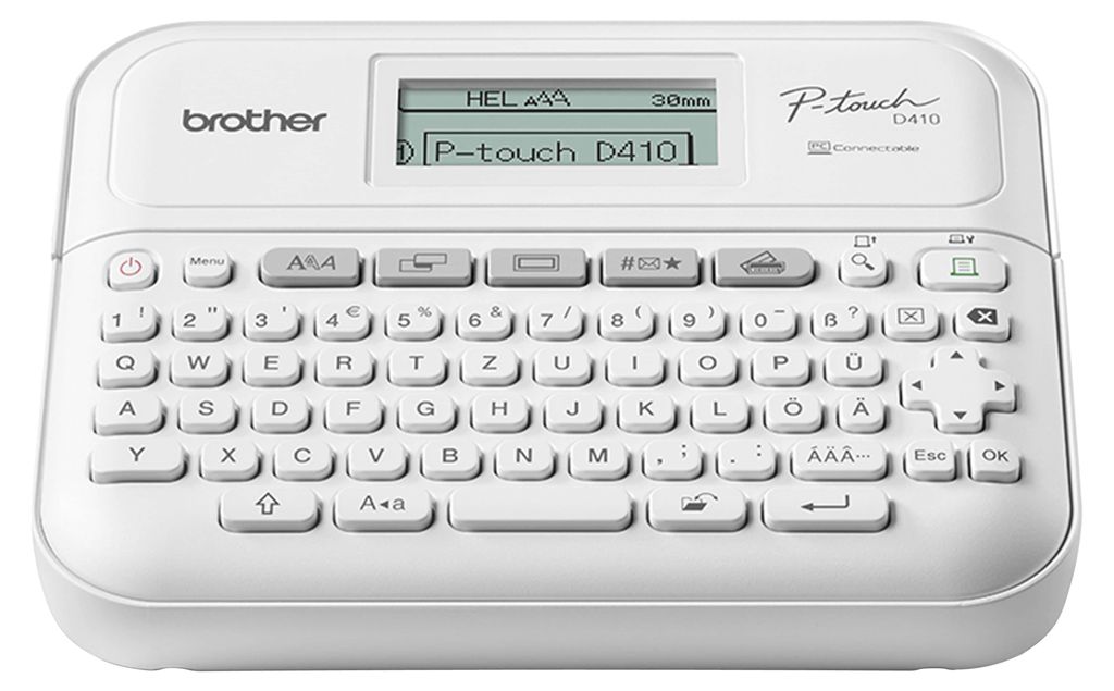 A white Brother P-touch D410 desktop label maker with a keyboard and screen.