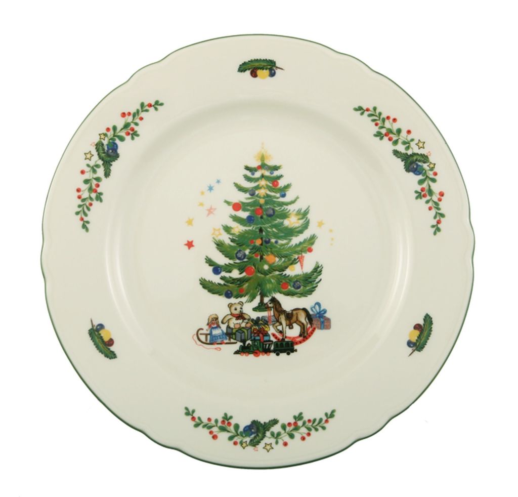 A Christmas-themed plate with a decorated tree and toys.
