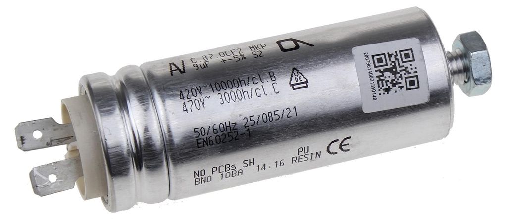 A silver cylindrical capacitor with electrical connectors and markings on its surface, set against a white background.