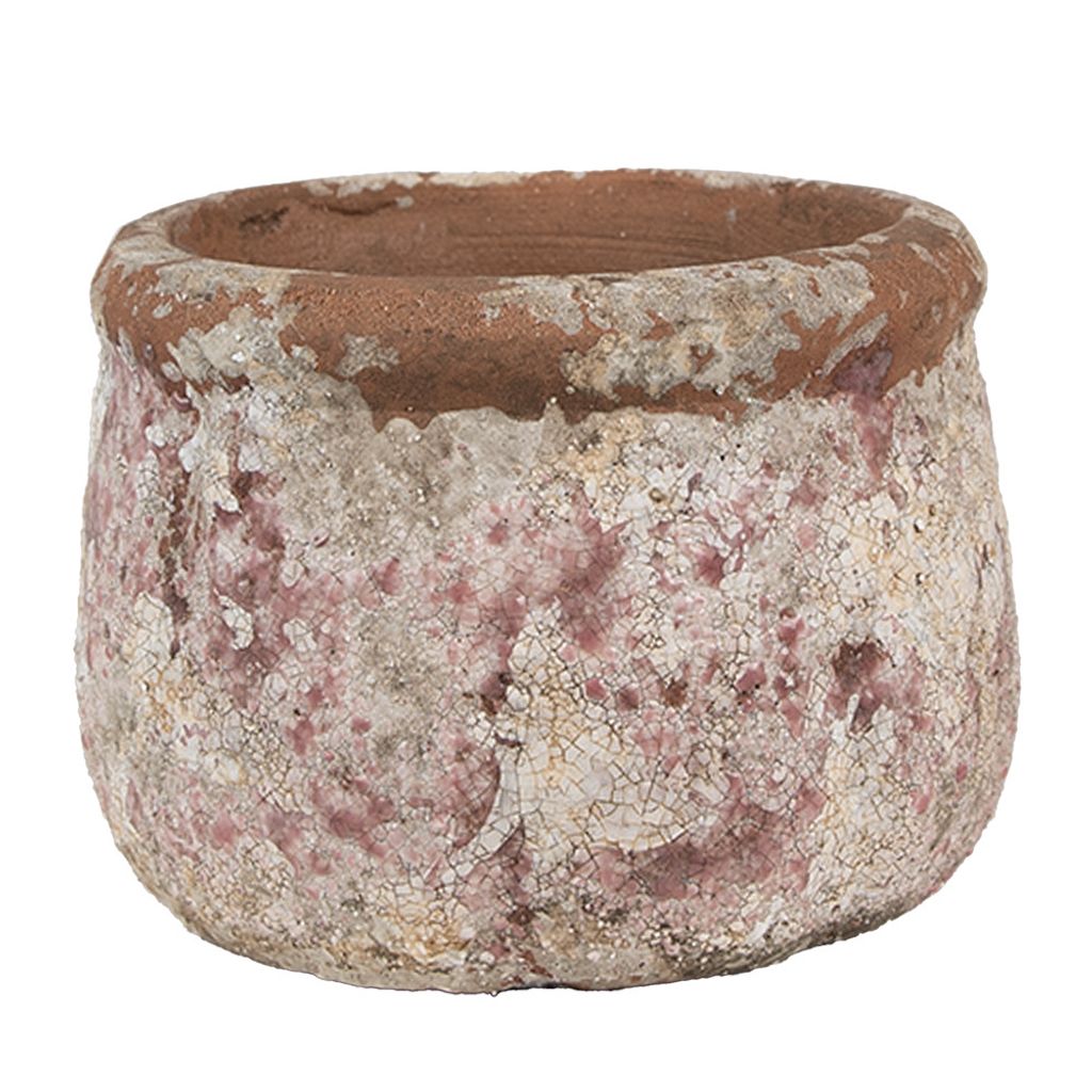 A close-up studio shot of a single, weathered terracotta pot with a pinkish hue and a textured, cracked surface.