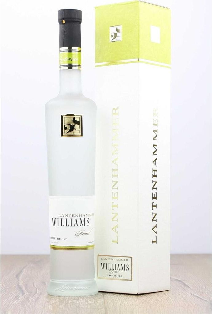 A bottle of Lantenhammer Williams Pear Brandy and its gift box are displayed on a wooden surface against a white background.