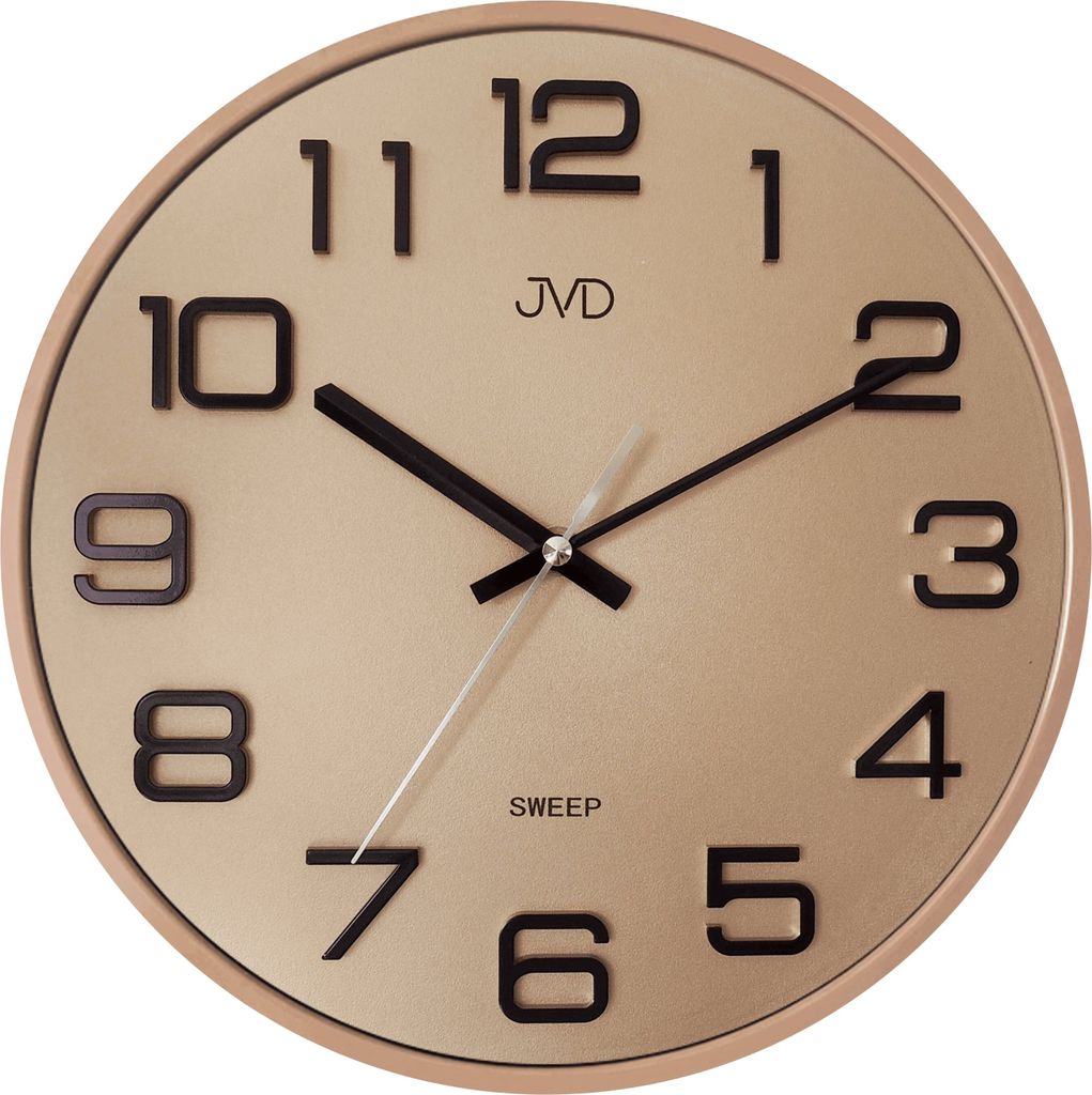 A close-up studio shot of a gold analog wall clock with black numbers and hands.