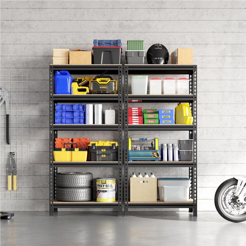 Two black metal shelving units filled with various items like tools, containers, tires, and a helmet, in a garage or workshop setting.