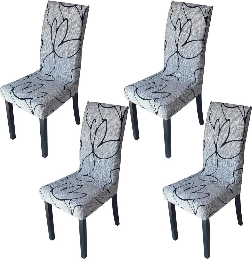 Four dining chairs with a floral pattern on a white background.