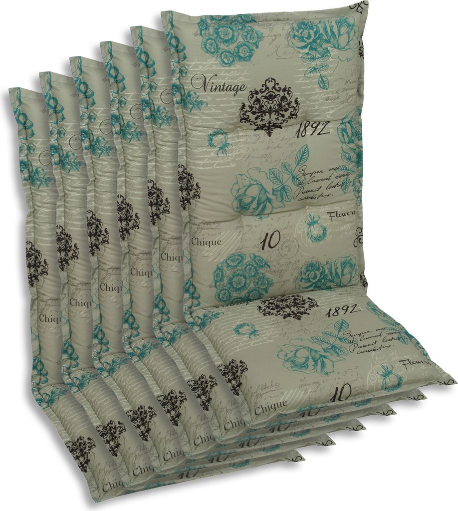 A stack of chair cushions with a vintage floral pattern.