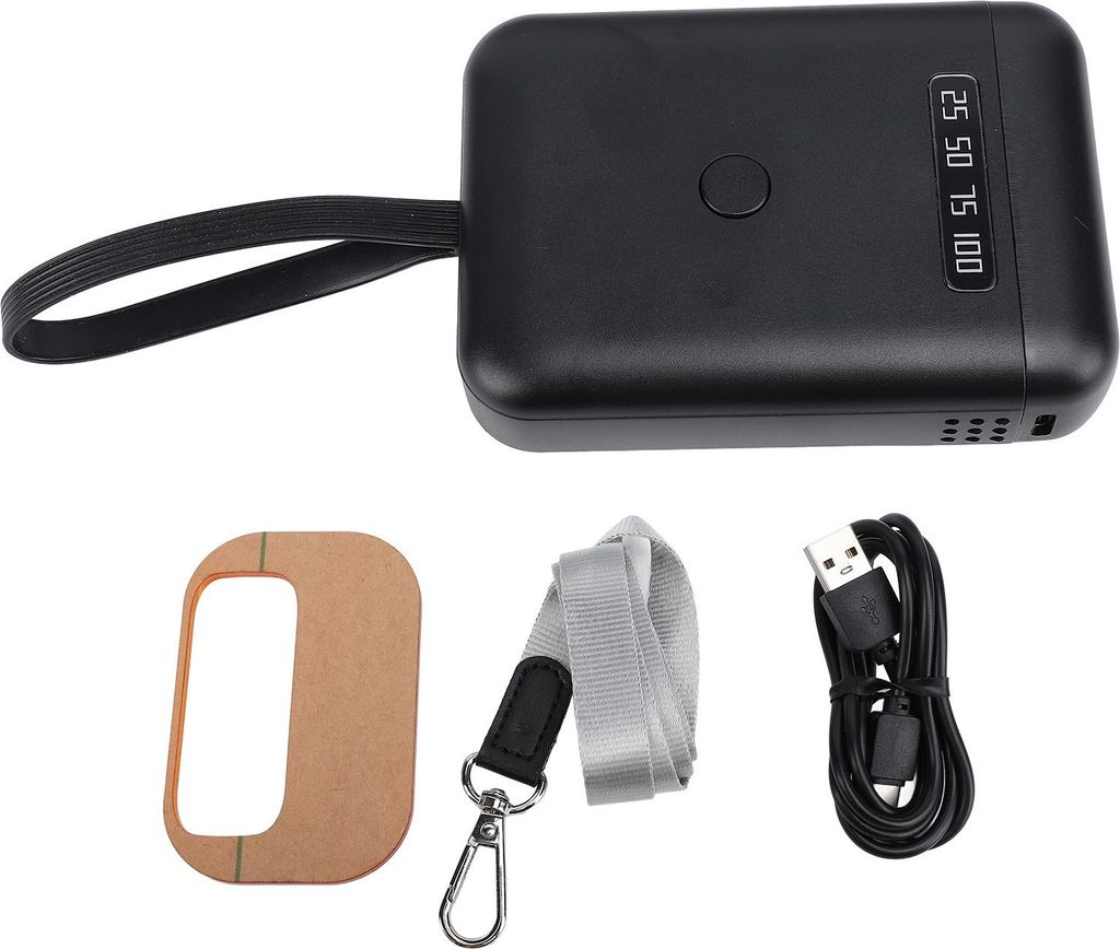 A black handheld LED UV light with accessories laid out on a white background.