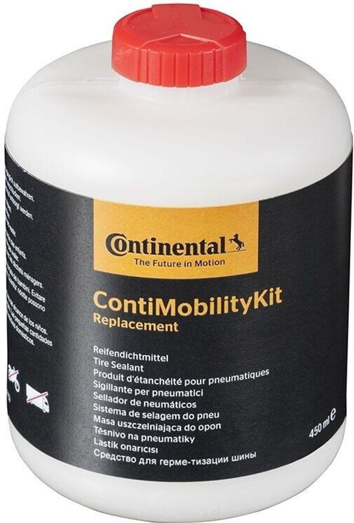 A white plastic bottle with a red cap containing tire sealant.