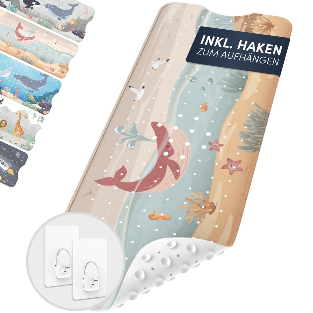 A shower mat with a whale design, shown with included hanging hooks.