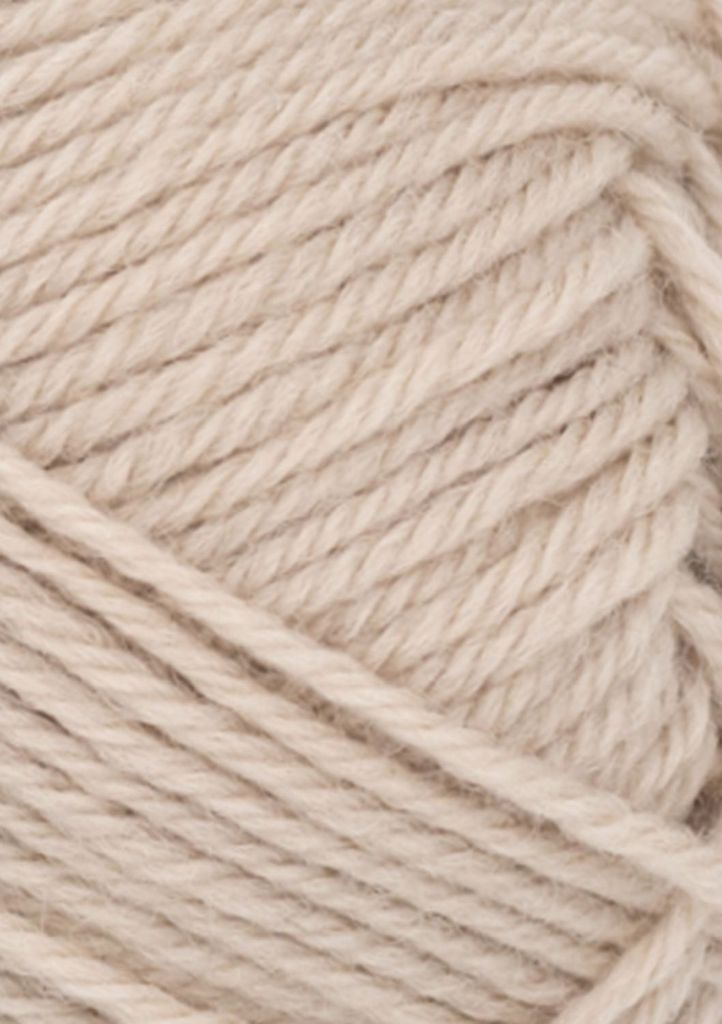 A close-up, textured view of a ball of beige yarn.