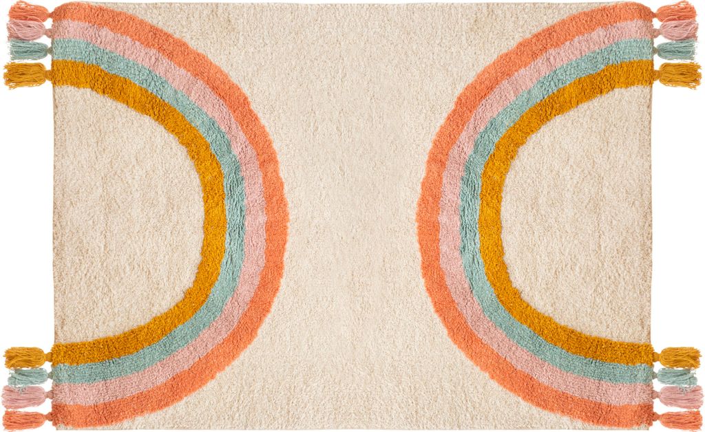 A flat lay image of a rectangular rug with a cream background and a rainbow design on each side.