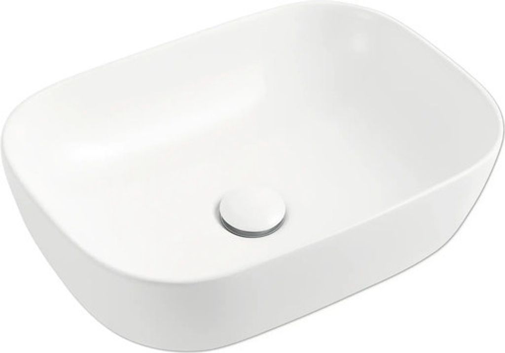 A white ceramic vessel sink with a drain.