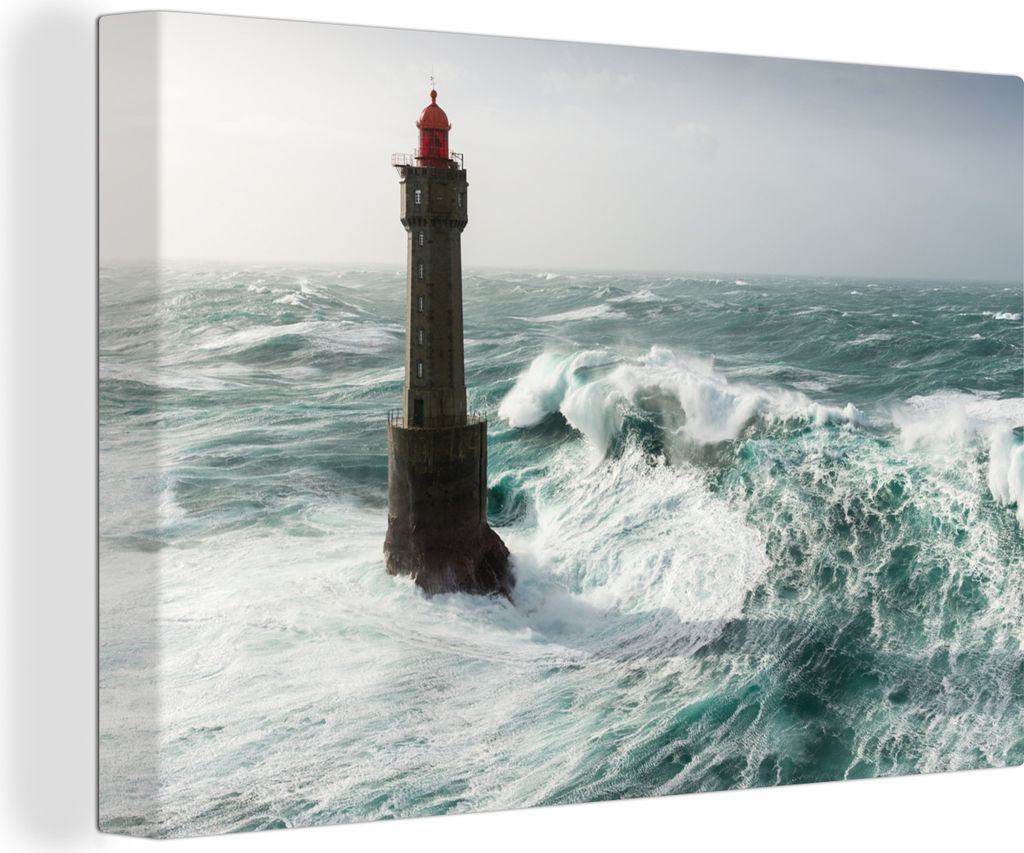 OneMillionCanvasses - Leinwandbilder - 140x90 cm, Eine Welle hinter dem Leuchtturm von La Jument in Frankreich, Wandbilder Kunstdruck Wanddekorat...