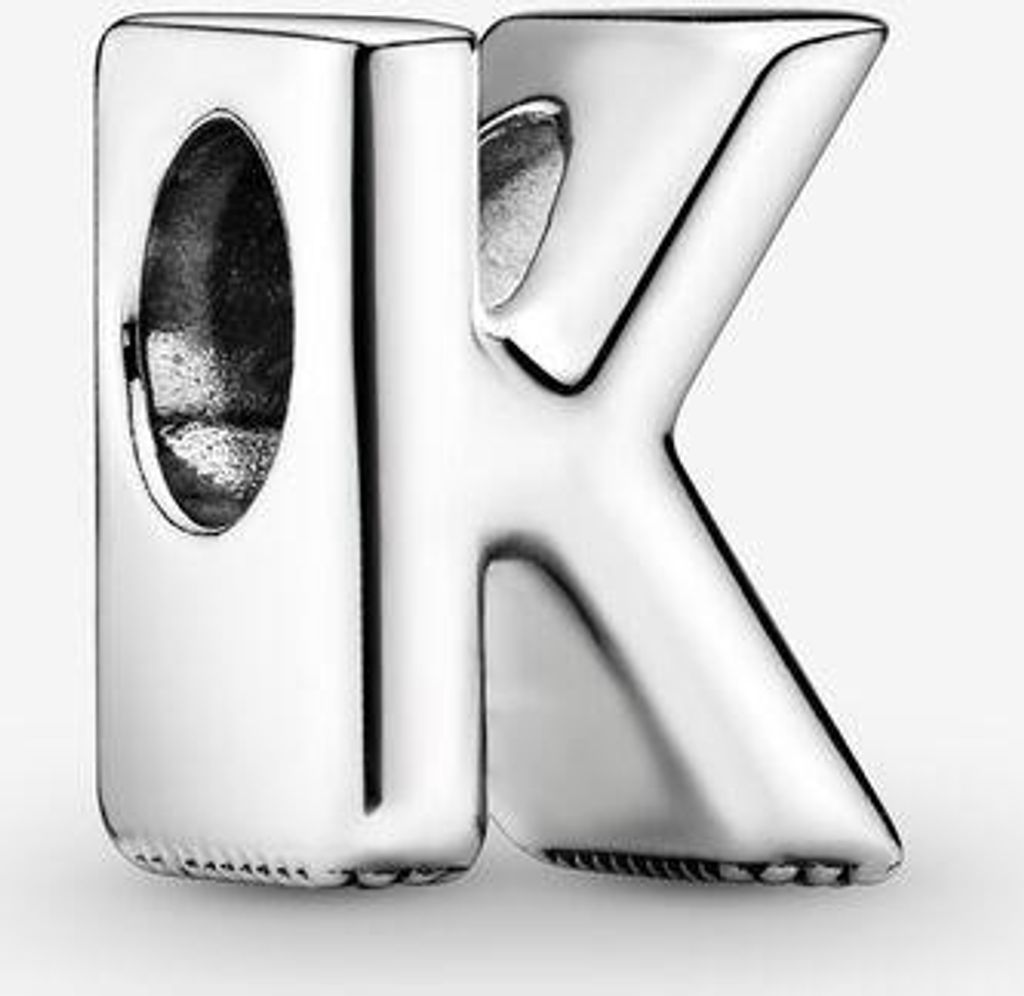 A close-up studio shot of a silver letter 'K' charm.