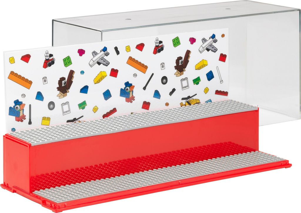 A display case for LEGO bricks with a decorative background and a clear plastic cover.