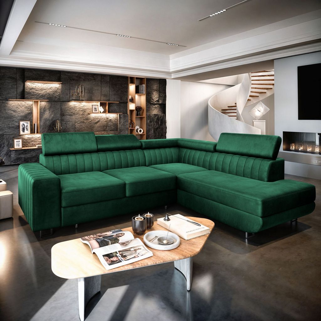 A modern living room with a large green sectional sofa and a spiral staircase in the background.