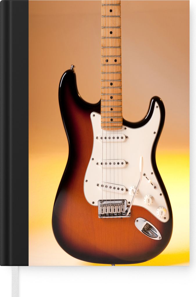 MuchoWow Notizbuch Tagebuch Haushaltsbuch Notebook A5 Eine E-Gitarre mit orangefarbenem Hintergrund - Notizblock - Notizheft - Notebook - Schreib...