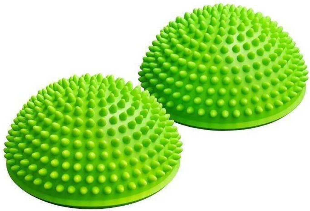 Two green balance pods with nubs on a white background.