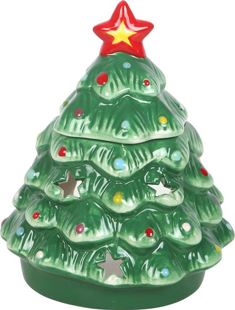 A ceramic Christmas tree-shaped oil burner.